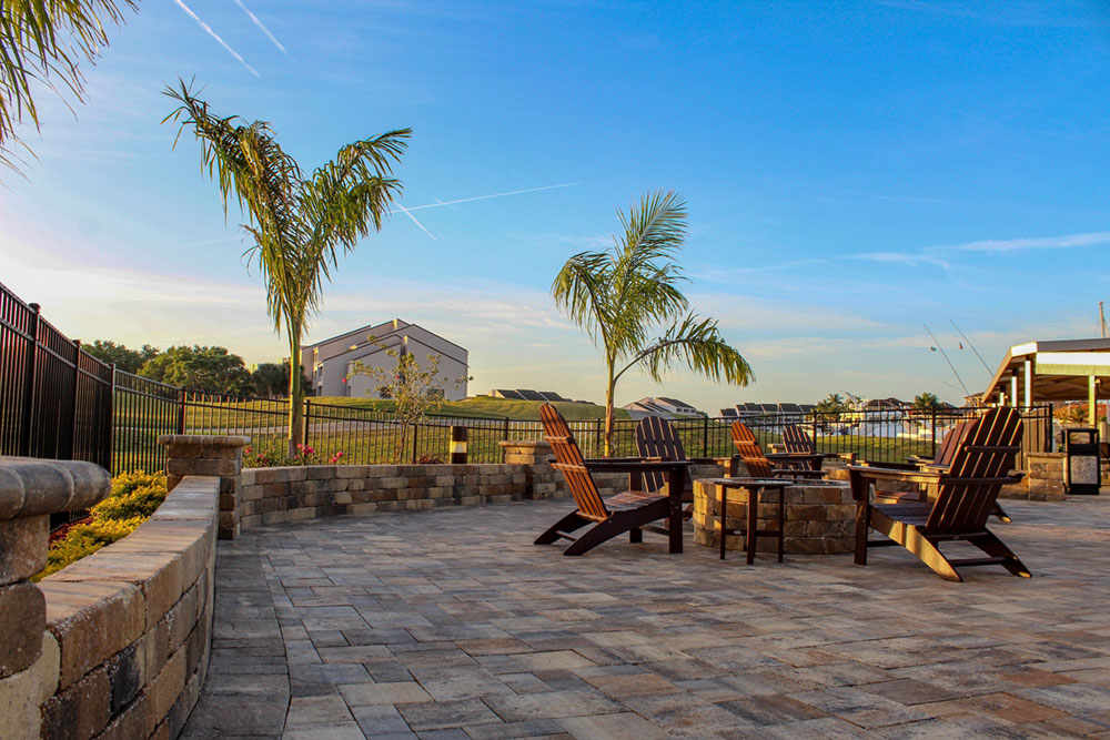 Paver fire pits overlooking the golf course and Boca Ciega Bay